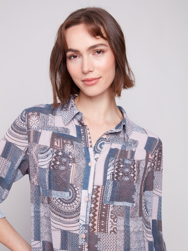 Patchwork design blouse with chest pockets and button-down style, combining fashion and functionality by Charlie B.