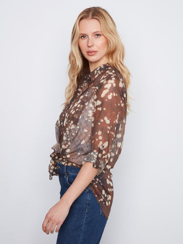 Trendy blouse featuring adjustable roll-up sleeves and a rounded hem for effortless sophistication by Charlie B.