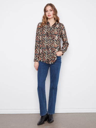With long sleeves, this shirt is ideal for layering in cooler weather or wearing alone on warmer days. By Charlie B.