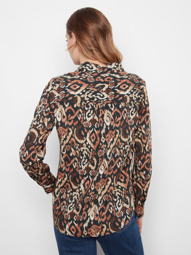 A versatile piece with a unique design that can be dressed up or down for any occasion. By Charlie B.