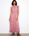 Floral maxi dress featuring a notched neckline with front tie, perfect for a breezy summer day. By Charlie B.