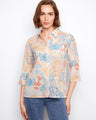 Coraline blouse featuring a classic shirt collar and abstract design, perfect for casual elegance by Charlie B.
