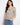 Floral blouse with a stylish chest pocket, perfect for casual outings. Designed by Charlie B.