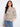 Charming blouse with a half-button design, making it versatile for various occasions. Crafted by Charlie B.