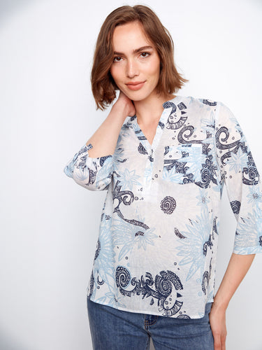 Featuring adjustable roll-up sleeves, this top combines style with practicality for everyday wear. Made by Charlie B.