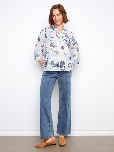 This chic top is designed with comfort in mind, offering a relaxed fit that pairs well with jeans or skirts. Crafted by Charlie B.