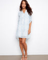 Henley shirt dress in light blue with an adjustable 3/4 sleeve design, perfect for versatile styling by Charlie B.