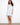 Henley shirt dress in light blue with an adjustable 3/4 sleeve design, perfect for versatile styling by Charlie B.