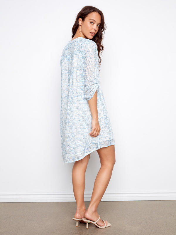 Stylish knee-length shirt dress with a half-button design for easy wearability by Charlie B.