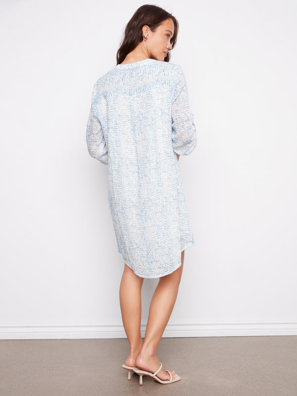 Relaxed-fit Henley shirt dress in light blue, designed with a chic neckline for effortless fashion by Charlie B.