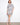 The dress features a chic chest pocket, adding both style and functionality to the overall design by Charlie B.