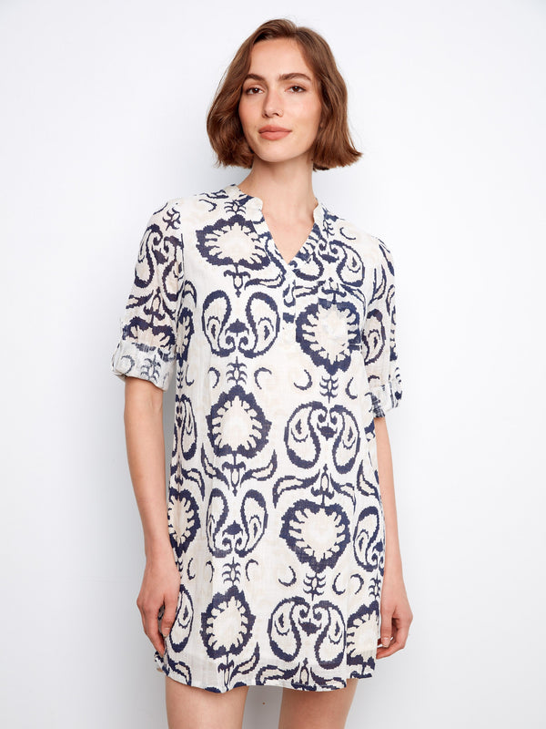 Showcasing a classic Henley neckline, this dress combines elegance with casual charm by Charlie B.