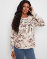 Floral top featuring a classic crew neckline, crafted from 100% cotton for comfort. Perfect for casual outings. by Charlie B.