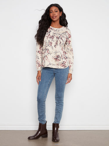 Chic floral design combined with drop shoulders offers both style and ease in this comfortable cotton piece. by Charlie B.