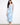 Blue patterned dress featuring a crew neckline, crafted from 100% cotton for comfort and breathability. By Charlie B.