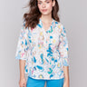 Cotton blouse featuring a Mao collar and vibrant print by Charlie B.