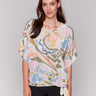 Crew neck blouse with abstract pastel pattern by Charlie B.