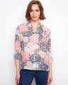 Floral blouse with a classic shirt collar, featuring vibrant hues and a relaxed fit for effortless style by Charlie B.