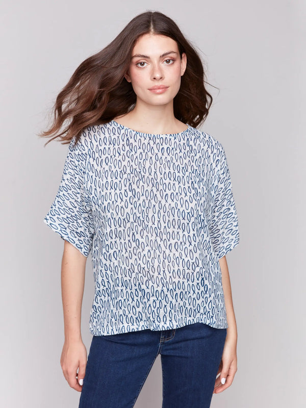 Crew neck design with abstract fish prints by Charlie B.