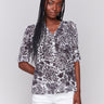 Pepper-colored blouse featuring a Mao collar and abstract pattern by Charlie B.
