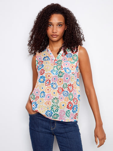Chic floral blouse with a convenient chest pocket, offering both style and functionality. Crafted by Charlie B.