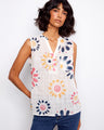 Floral top with a stylish Henley neckline and vibrant print, perfect for summer outings. Designed with comfort in mind by Charlie B.