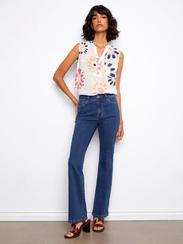 Chic sleeveless top featuring a half-button front for an easy, breezy look. Ideal for casual days by Charlie B.