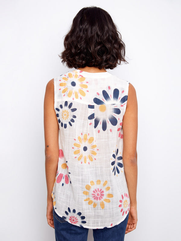 Back view of the floral pattern on this airy sleeveless blouse highlights its playful yet sophisticated style by Charlie B.