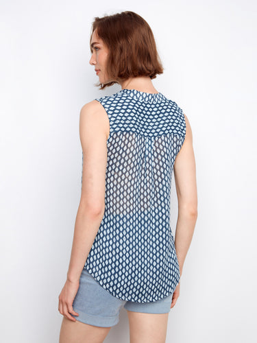 Geometric print blouse designed for comfort with its half-button front and breathable fabric by Charlie B.