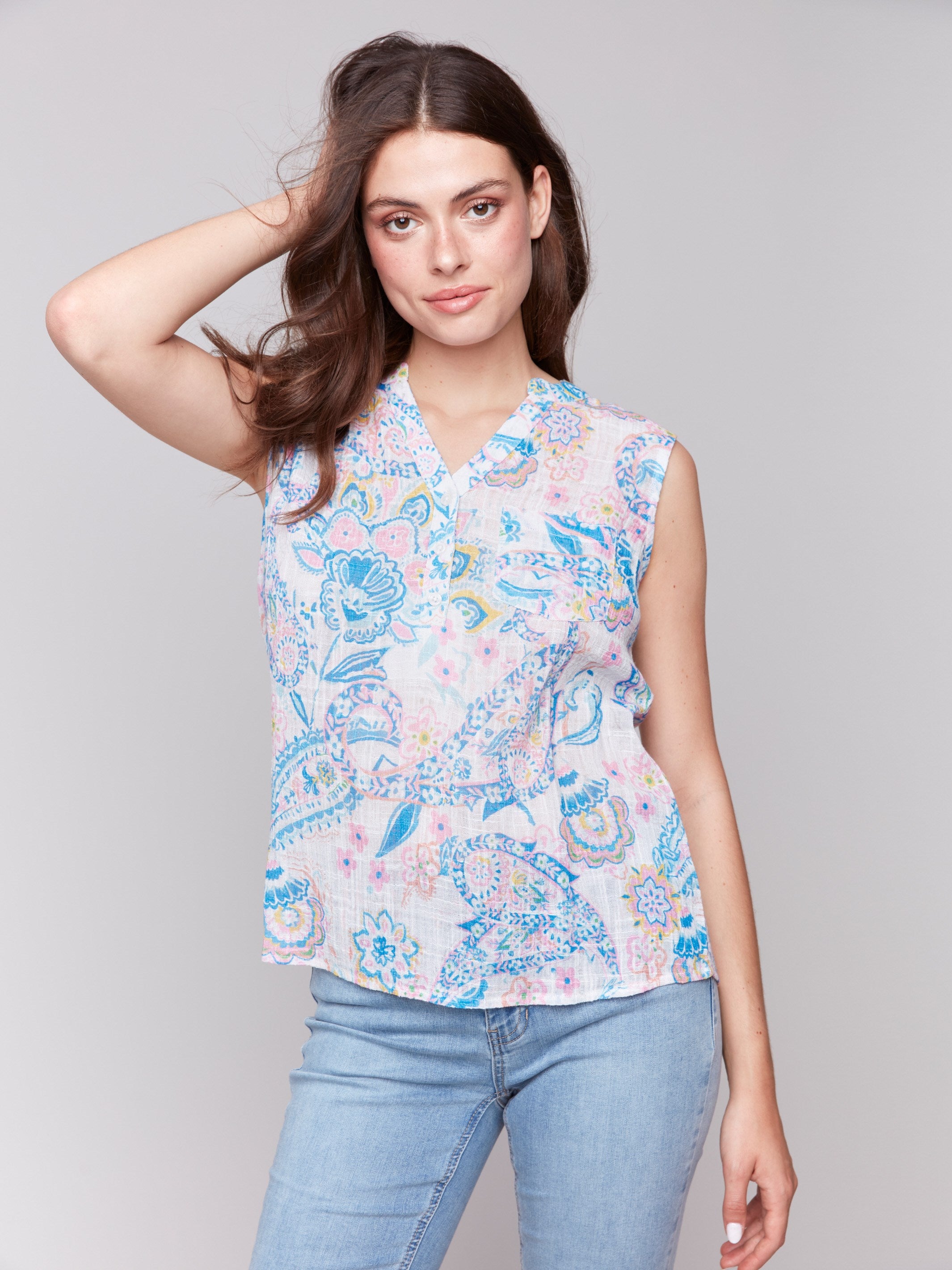 V-neck sleeveless top featuring an abstract pattern, crafted by Charlie B.