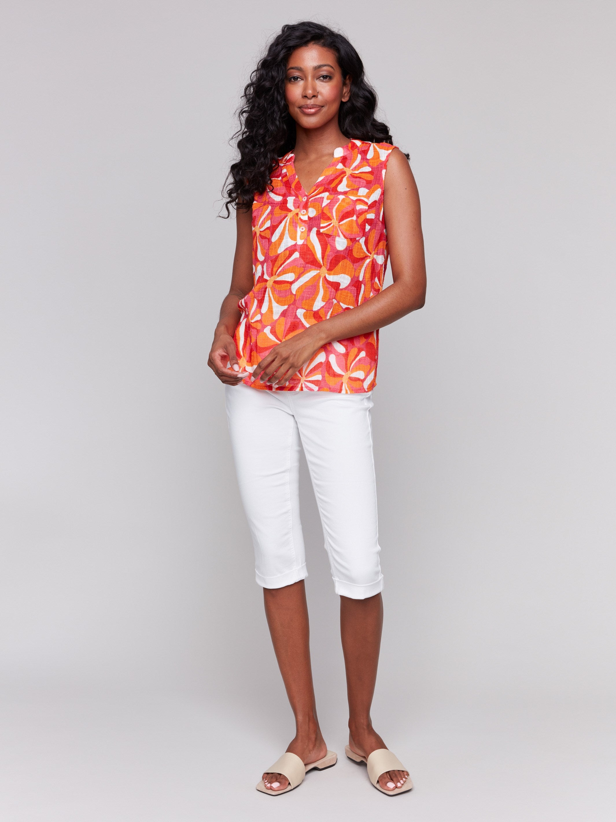 Cotton gauze top featuring a chest pocket and high-low hem by Charlie B.