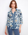 Floral shirt featuring a classic button-up closure, perfect for casual outings. The design adds elegance to any wardrobe by Charlie B.