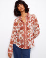 Floral printed blouse with a classic shirt collar and button-up closure, offering a chic style by Charlie B.