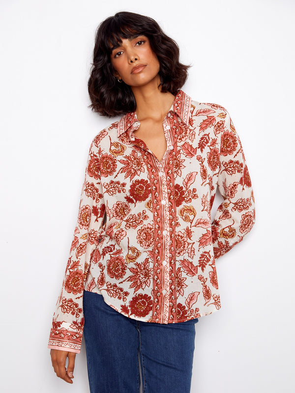 Floral printed blouse with a classic shirt collar and button-up closure, offering a chic style by Charlie B.