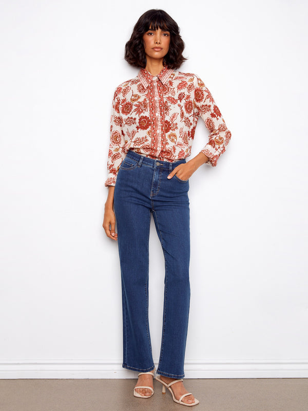 Stylish cotton voile blouse showcasing intricate floral patterns and sophisticated shirt collar by Charlie B.