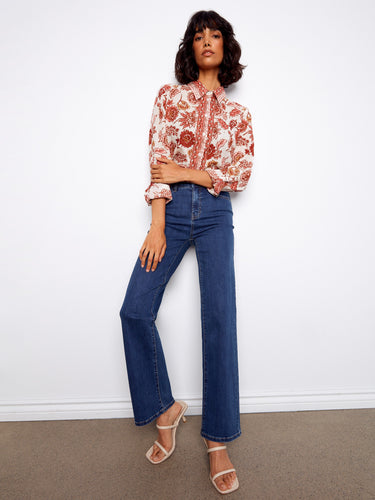 Elegant floral print on soft cotton voile material, showcasing the tailored shirt collar and refined style by Charlie B.