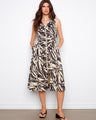 Abstract print dress featuring a V-neck and hidden pockets, perfect for a chic look by Charlie B.