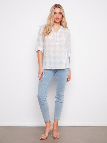 Stylish plaid top with a half-button design, combining comfort and fashion effortlessly by Charlie B.