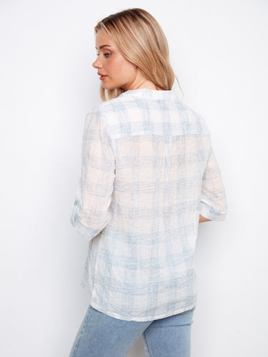 Casual plaid blouse with adjustable sleeves and Henley neckline for a relaxed yet chic look by Charlie B.