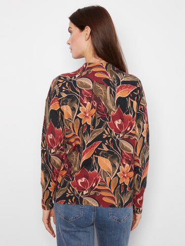 Chic drop shoulder design on this floral sweater adds flair to your ensemble, perfect for any occasion. By Charlie B.