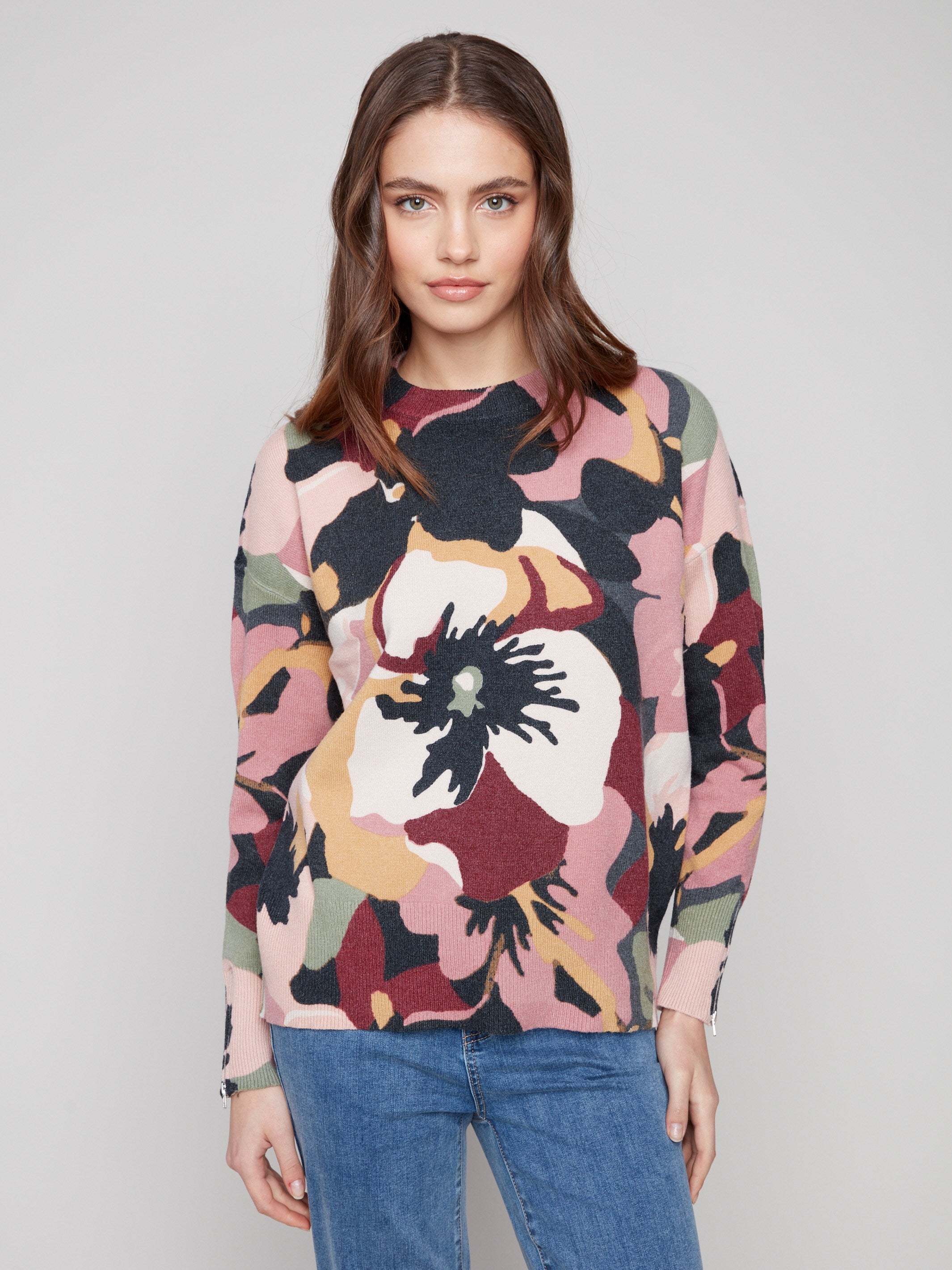 Sweater featuring a crew neck and abstract floral design, perfect for casual outings by Charlie B.