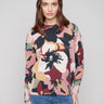 Sweater featuring a crew neck and abstract floral design, perfect for casual outings by Charlie B.