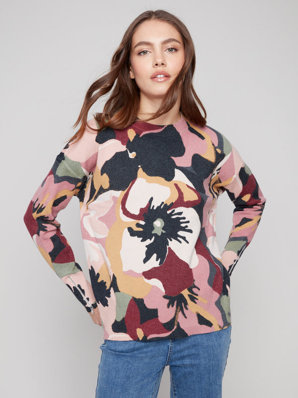 Relaxed fit sweater with vibrant floral patterns, ideal for a stylish look by Charlie B.