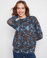 Sweater with a stylish crew neckline, featuring a unique pattern in blue and brown tones for a chic look by Charlie B.