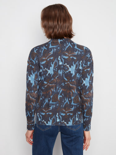 The zippered cuffs on this sweater add a touch of modernity to its classic style, making it versatile by Charlie B.