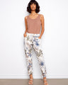 Women's jogger pants with a vibrant floral print, featuring slim fit design and comfortable stretch fabric by Charlie B.