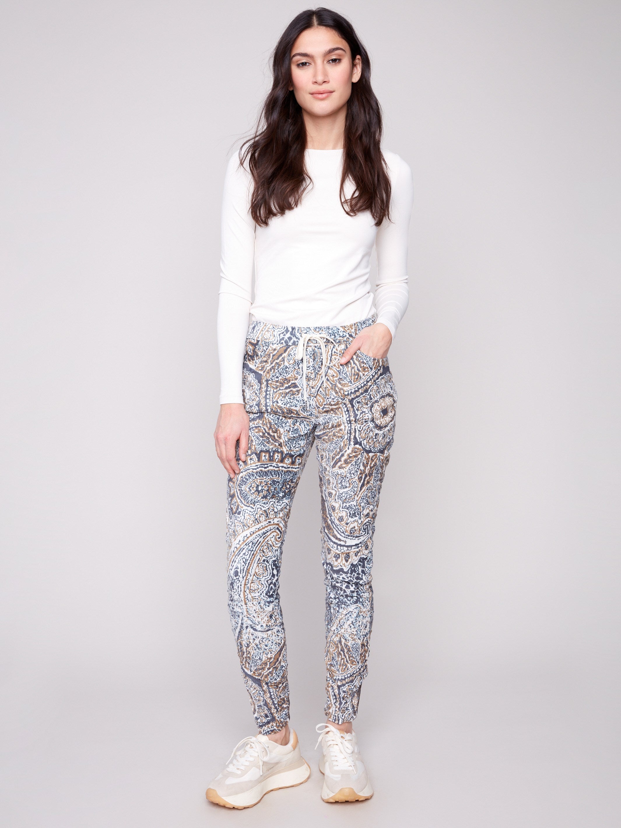 Jogger pants with stretch fabric for added comfort, featuring a bohemian print and elastic waistband by Charlie B.