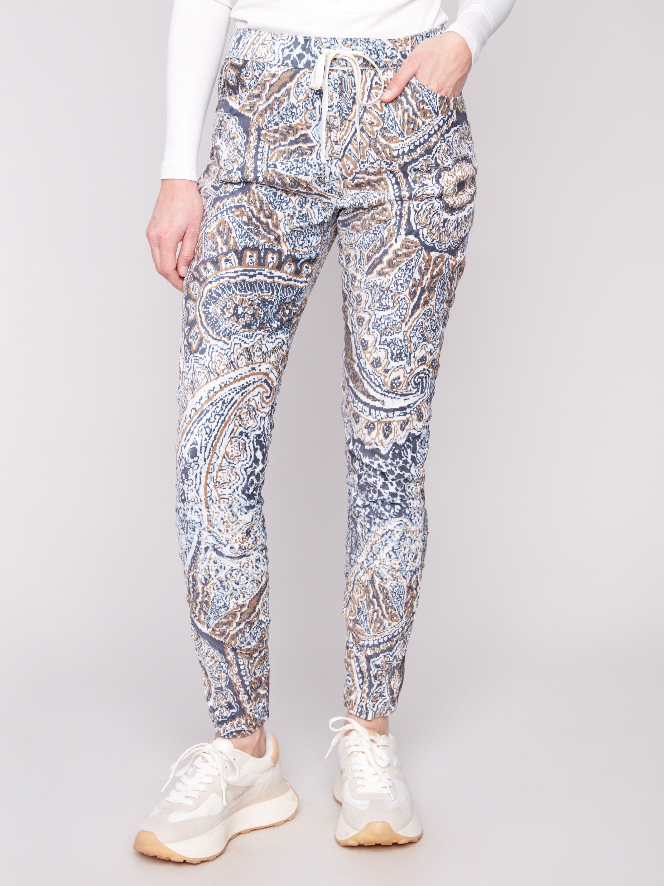 These joggers have side pockets and a crinkle effect, offering both style and practicality by Charlie B.