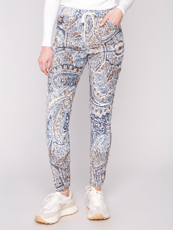 These joggers have side pockets and a crinkle effect, offering both style and practicality by Charlie B.