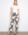 Wide-leg pants in a black and white leaf design, featuring a cropped length for a chic look by Charlie B.
